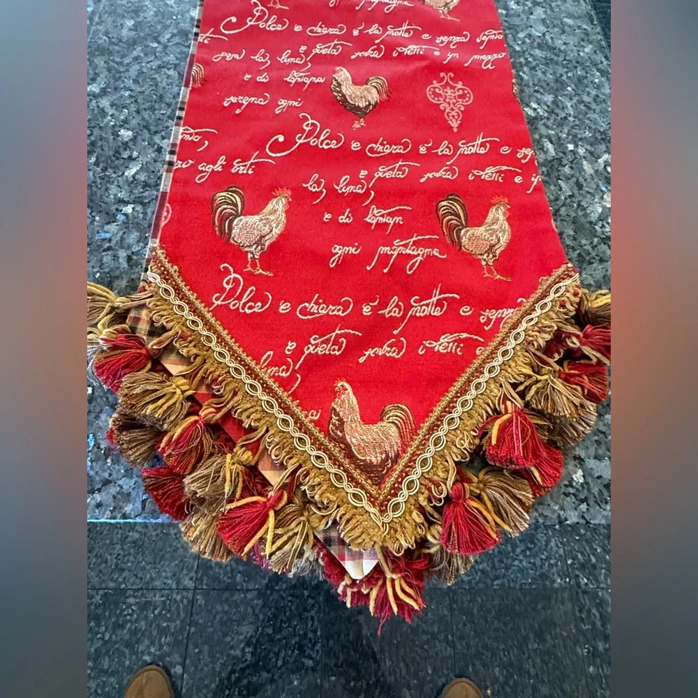 Red jacquard table runner featuring a traditional French rooster design 104x12”